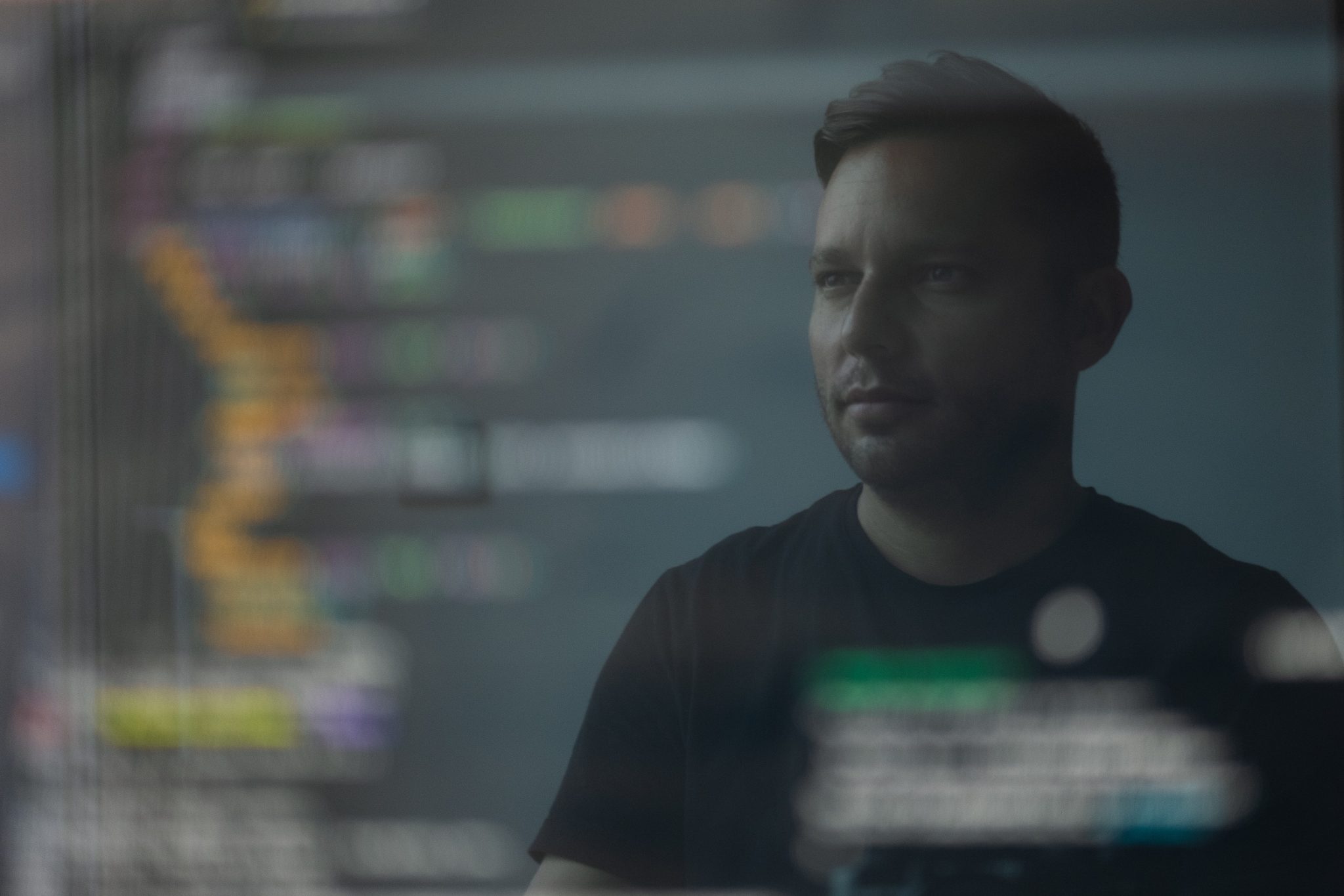 Engineer reviewing application code on screen